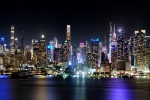 A New York City skyline of the panoramic view of Midtown Manhattan as seen from Weehawken, New Jersey at night. Large-format prints of this photo are available up to 120 inches in width, framed in wood, metal and acrylic styles.