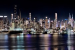 A high-definition panoramic skyline of the west side of Midtown Manhattan at night stretching from Via57 to the Empire State Building. Large-format fine art prints of this photo are available up to 250 inches in width and framed in contemporary styles.