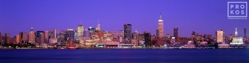 A large-scale panoramic skyline of New York City and the Hudson River at dusk as seen from Hoboken, NJ. Fine art prints of this photo are available framed in various styles. 