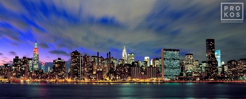 A panorama of Midtown Manhattan at dusk as seen from Queens, New York City