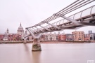 A view of the Millennium Bridge, Thames River, and St. Paul's Cathedral, London during the day captured in an eight minute long exposure by fine art photographer Andrew Prokos. Limited edition fine art prints are available up to 72 inches in width.