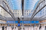 An interior view of Moynihan Train Hall / Farley Building in Manhattan, New York City during the day. Captured by architectural photographer Andrew Prokos for Vornado Realty Trust. The renovation architect is Skidmore, Owings & Merrill (SOM). Fine art prints are available framed in various styles.