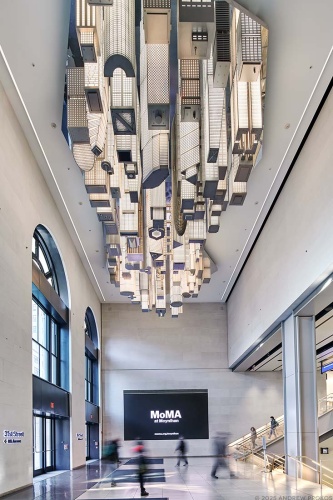 A view of the 31st Street entrance of Moynihan Train Hall / Farley Building in Manhattan, New York City with "The Hive" sculpture by artists Elmgreen & Dragset. Captured by architectural photographer Andrew Prokos for Vornado Realty Trust. The renovation architect is Skidmore, Owings & Merrill (SOM). Fine art prints are available framed in wood, metal and acrylic styles.