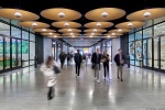 A long-exposure interior view of the retail concourse and the dual lobbies of Meta, Inc. at Moynihan Train Hall, Penn Station in Manhattan, New York City. Captured by architectural photographer Andrew Prokos for Vornado Realty Trust. Andrew is available for commercial, advertising and architectural photo shoots worldwide.