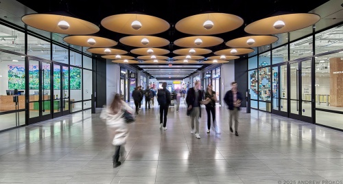 A long-exposure interior view of the retail concourse and the dual lobbies of Meta, Inc. at Moynihan Train Hall, Penn Station in Manhattan, New York City. Captured by architectural photographer Andrew Prokos for Vornado Realty Trust. Andrew is available for commercial, advertising and architectural photo shoots worldwide.