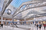 View of the main concourse of Moynihan Train Hall, Penn Station / Farley Building in New York City as seen during the day. Photo by architectural photographer Andrew Prokos for Vornado. The architect is Skidmore, Owings & Merrill (SOM). Fine art prints are available framed in various styles.