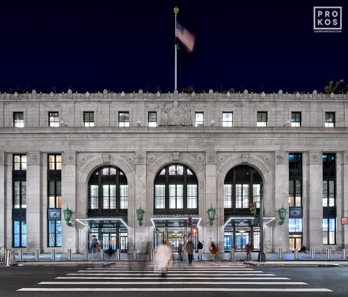 An architectural view of the west facade of Moynihan Train Hall / the Farley Building as seen at night. Captured by architectural photographer Andrew Prokos for Vornado Realty Trust. The renovation architect is Skidmore, Owings & Merrill (SOM). Framed fine art prints of this photo are available in wood, metal and acrylic styles.