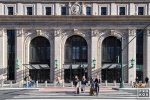 An architectural view of the western (Ninth Avenue) facade of Moynihan Train Hall / the Farley Building as seen during the day. Captured by architectural photographer Andrew Prokos for Vornado Realty Trust. The renovation architect is Skidmore, Owings & Merrill (SOM). Framed fine art prints of this photo are available in wood, metal and acrylic styles.