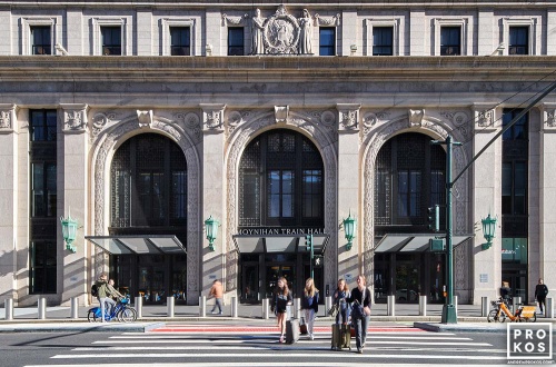 An architectural view of the western (Ninth Avenue) facade of Moynihan Train Hall / the Farley Building as seen during the day. Captured by architectural photographer Andrew Prokos for Vornado Realty Trust. The renovation architect is Skidmore, Owings & Merrill (SOM). Framed fine art prints of this photo are available in wood, metal and acrylic styles.
