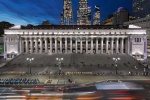 A view of the Farley Building and Moynihan Train Hall in Manhattan, New York, as captured at dusk by fine art and architectural photographer Andrew Prokos