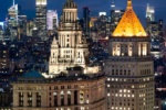 A high-definition cityscape photo of the Municipal Building and 40 Centre Street at dusk, with the skyscrapers of Midtown Manhattan and the Empire State Building in the distance, New York City. Large-scale fine art prints of this photo are available up to 60".