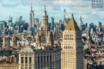 A view of the Municipal Building and 40 Centre Street in the foreground, with the skyscrapers of Midtown Manhattan and the Empire State Building in the distance, New York City