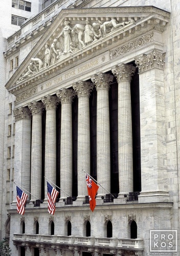 A fine art architectural photo of the facade of the New York Stock Exchange (NYSE) during the day