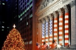 A fine art photo of the New York Stock Exchange (NYSE) with lighted Christmas tree as seen from Wall Street at night