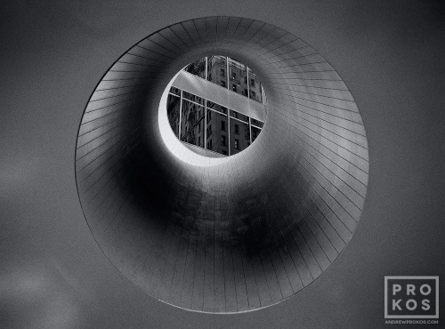 A black and white fine art photo Isamu Noguchi's cube sculpture in New York's Financial District