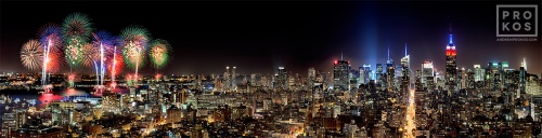 A panoramic long-exposure cityscape photo of the New York City skyline at night with fireworks on the Fourth of July
