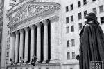 A fine art architectural photo of the New York Stock Exchange (NYSE) and the statue of George Washington at Federal Hall in black and white, New York City
