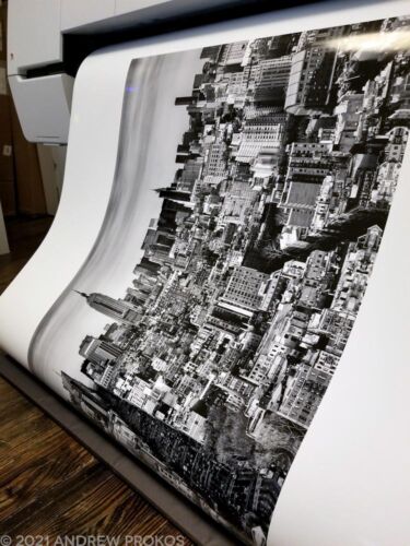 A large black and white cityscape photograph of Manhattan as seen from SoHo by photographer Andrew Prokos