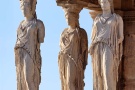 A color fine art photograph of the famed caryatids from the Erechtheion on the Acropolis in Athens, Greece