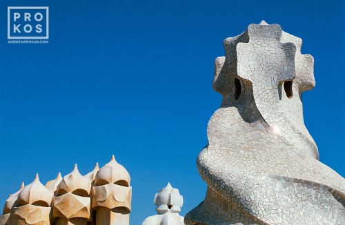 A photo of Antoni Gaudi's famous modernist chimneys on the rooftop of the Casa Mila (La Pedrera), Barcelona, Spain. Framed fine art prints of this photo are available in various sizes.