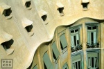 An architectural photo of Casa Mila (the Pedrera), one of the best examples of the Modernist architecture of Antoni Gaudi in Barcelona, Spain