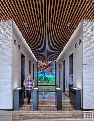 An interior view of the digital elevator banks in the lobby at Penn 1 tower, New York City. Photographed by architectural photographer Andrew Prokos for Vornado Realty Trust. Andrew is available for commercial, architectural, and advertising photo shoots worldwide.