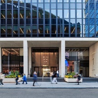 A street view of the exterior of Penn 1 tower with pedestrians, New York City, as seen during the day. Photographed by architectural photographer Andrew Prokos for Vornado Realty Trust. Andrew is available for commercial, advertising and architectural photo shoots worldwide.