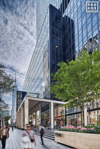 A street view of the exterior of Penn 1 tower with pedestrians, New York City, as seen during the day. Photographed by architectural photographer Andrew Prokos for Vornado Realty Trust. Fine art prints of this photo are available in various sizes.
