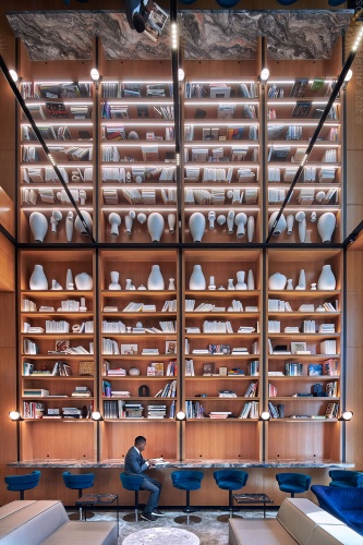 An interior view of the library at Penn 1 tower, New York City. The interior architect is A+I (Architecture Plus Information). Photographed by architectural photographer Andrew Prokos for Vornado Realty Trust. Fine art prints of this photo are available in various sizes.