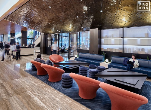 An interior view of the lobby and public seating at Penn 1 tower, New York City. The interior architect is A+I (architecture Plus Information). Photographed by architectural photographer Andrew Prokos for Vornado Realty Trust. Fine art prints of this photo are available in various sizes.