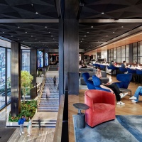 An interior view of the lobby as seen from the Mezzanine at Penn 1 tower, New York City. The interior architect is A+I (architecture Plus Information). Photographed by architectural photographer Andrew Prokos for Vornado Realty Trust. Fine art prints of this photo are available in various sizes.