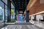 An interior view of the lobby and Digital Stairs at Penn 1 tower, New York City. The interior architect is A+I (architecture Plus Information). Photographed by architectural photographer Andrew Prokos for Vornado Realty Trust. Fine art prints of this photo are available in various sizes.