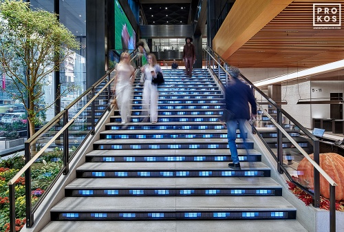 An interior view of the illuminated Digital Stairs at Penn 1 tower, New York City. The interior architect is A+I (architecture Plus Information). Photographed by architectural photographer Andrew Prokos for Vornado Realty Trust. Fine art prints of this photo are available in various sizes.