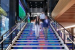 An interior view of the illuminated Digital Stairs at Penn 1 tower, New York City. The interior architect is A+I (architecture Plus Information). Photographed by architectural photographer Andrew Prokos for Vornado Realty Trust. Fine art prints of this photo are available in various sizes.
