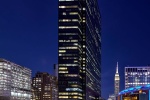 A view of Penn 1, Madison Square Garden, 8th Avenue and the Empire State Building in New York City as seen at night. Photographed by architectural photographer Andrew Prokos for Vornado Realty Trust. Fine art prints of this photo are available in various sizes.