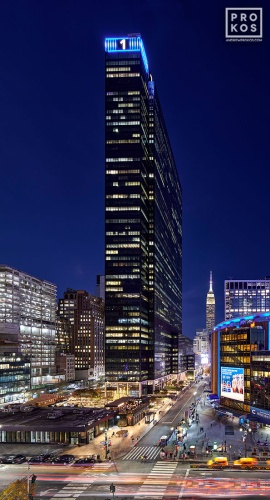 A view of Penn 1, Madison Square Garden, 8th Avenue and the Empire State Building in New York City as seen at night. Photographed by architectural photographer Andrew Prokos for Vornado Realty Trust. Fine art prints of this photo are available in various sizes.