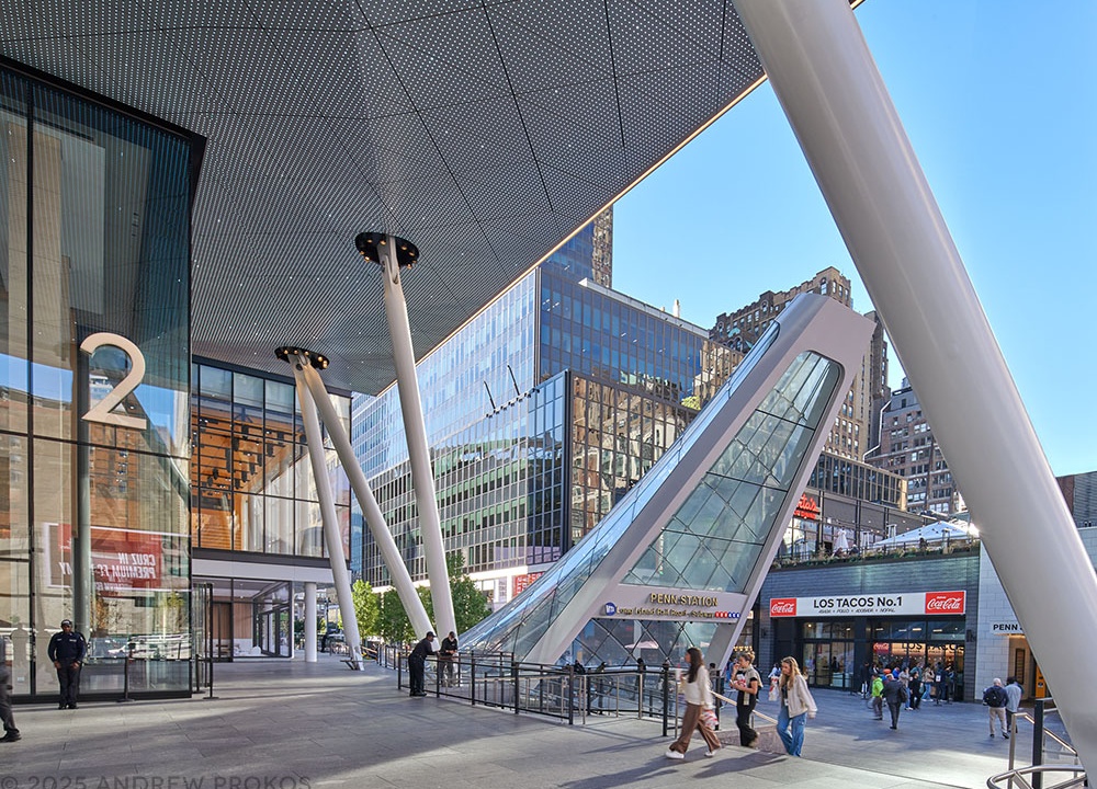 An exterior view of Penn 2 tower and the new entrance to Penn Station at 34th St. and 7th Ave. by MdeAS Architects, New York City. Photographed by architectural photographer Andrew Prokos for Vornado / The Penn District. Fine art prints of this photo are available framed in various styles