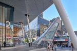 An exterior view of Penn 2 tower and the new entrance to Penn Station at 34th St. and 7th Ave. by MdeAS Architects, New York City. Photographed by architectural photographer Andrew Prokos for Vornado / The Penn District. Fine art prints of this photo are available framed in various styles