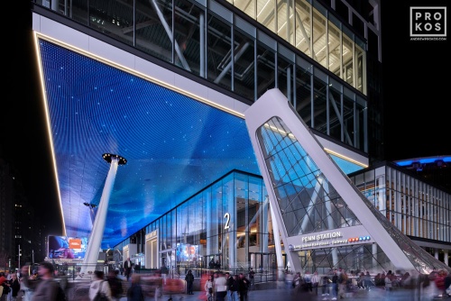 A night view of the LED-illuminated contemporary architecture of Penn 2 and the new entrance to Penn Station at 34th St. and 7th Ave. by MdeAS Architects, New York City by photographer Andrew Prokos. Fine art prints of this photo are available framed in various styles