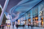 A view of the Bustle at Penn 2 tower as seen at night, New York City. Photographed by architectural photographer Andrew Prokos for Vornado / The Penn District. Fine art prints of this photo are available framed in various styles