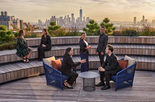 People enjoying the amenities at the Perch at Penn 2, New York City. Photographed by architectural photographer Andrew Prokos for Vornado Realty Trust.