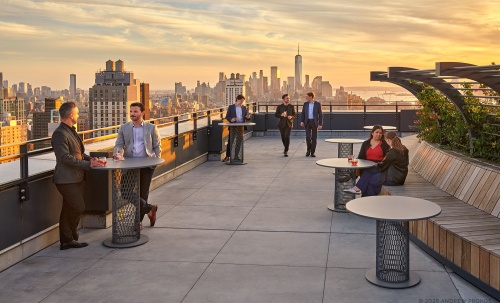A sunset view of the Perch rooftop amenities at Penn 2, New York City. Photographed by architectural photographer Andrew Prokos for Vornado Realty Trust.