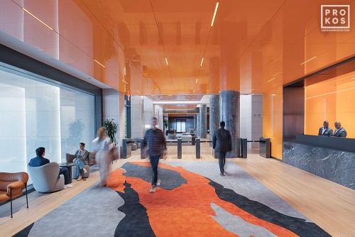 The sleek contemporary architectural interior of the sky lobby at Penn 2 tower with a view toward the concierge, New York City. Photographed by architectural photographer Andrew Prokos for Vornado Realty Trust. Fine art prints of this photo are available in various sizes.