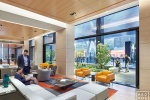 An architectural interior of the sky lobby at Penn 2 tower with a view toward the terrace and Sixth Avenue, New York City. Photographed by architectural photographer Andrew Prokos for Vornado Realty Trust. Fine art prints of this photo are available in various sizes.