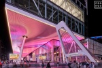 A view of Penn District and the LED-illuminated bustle of Penn 2 at night, New York City by photographer Andrew Prokos