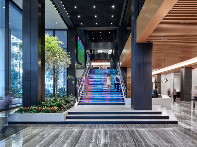 An interior view of the lobby and Digital Stairs at Penn 1 tower, New York City. The interior architect is A+I (architecture Plus Information). Photographed by architectural photographer Andrew Prokos for Vornado Realty Trust. Fine art prints of this photo are available in various sizes.
