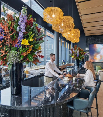 A view of the bar at The Perch, the roof terrace at Penn 2, Manhattan, NYC. Photographed by architectural photographer Andrew Prokos for Vornado Realty Trust.