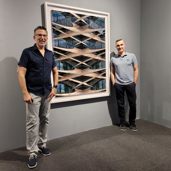 Photographer Andrew Prokos with SIPA Awards Director Luca Venturi at Metropolis Abstracted Exhibition