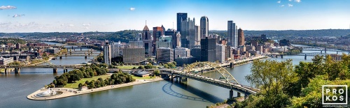 An ultra-high resolution panoramic skyline of Pittsburgh, Pennsylvania during the day.