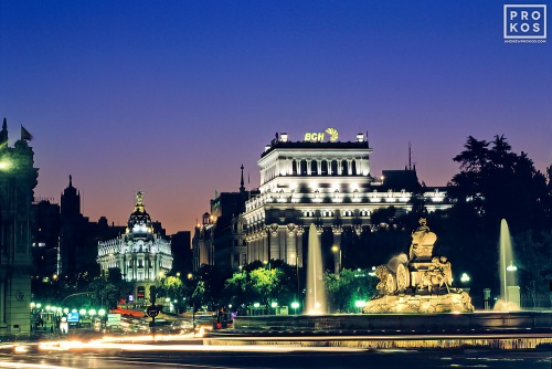 A view of Plaza de las Cibeles at dusk, Madrid, Spain. Framed fine art prints of this photo are available in various sizes.